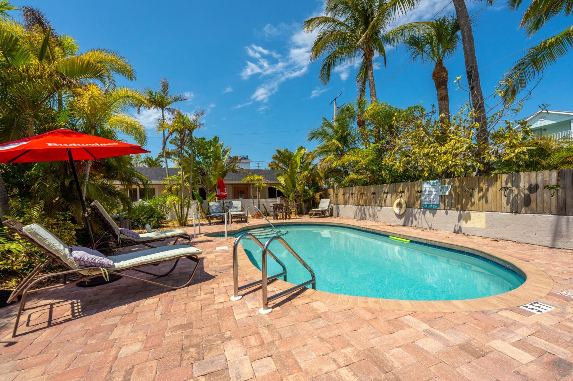 An Island Getaway At Palm Tree Villas هولمز بيتش المظهر الخارجي الصورة